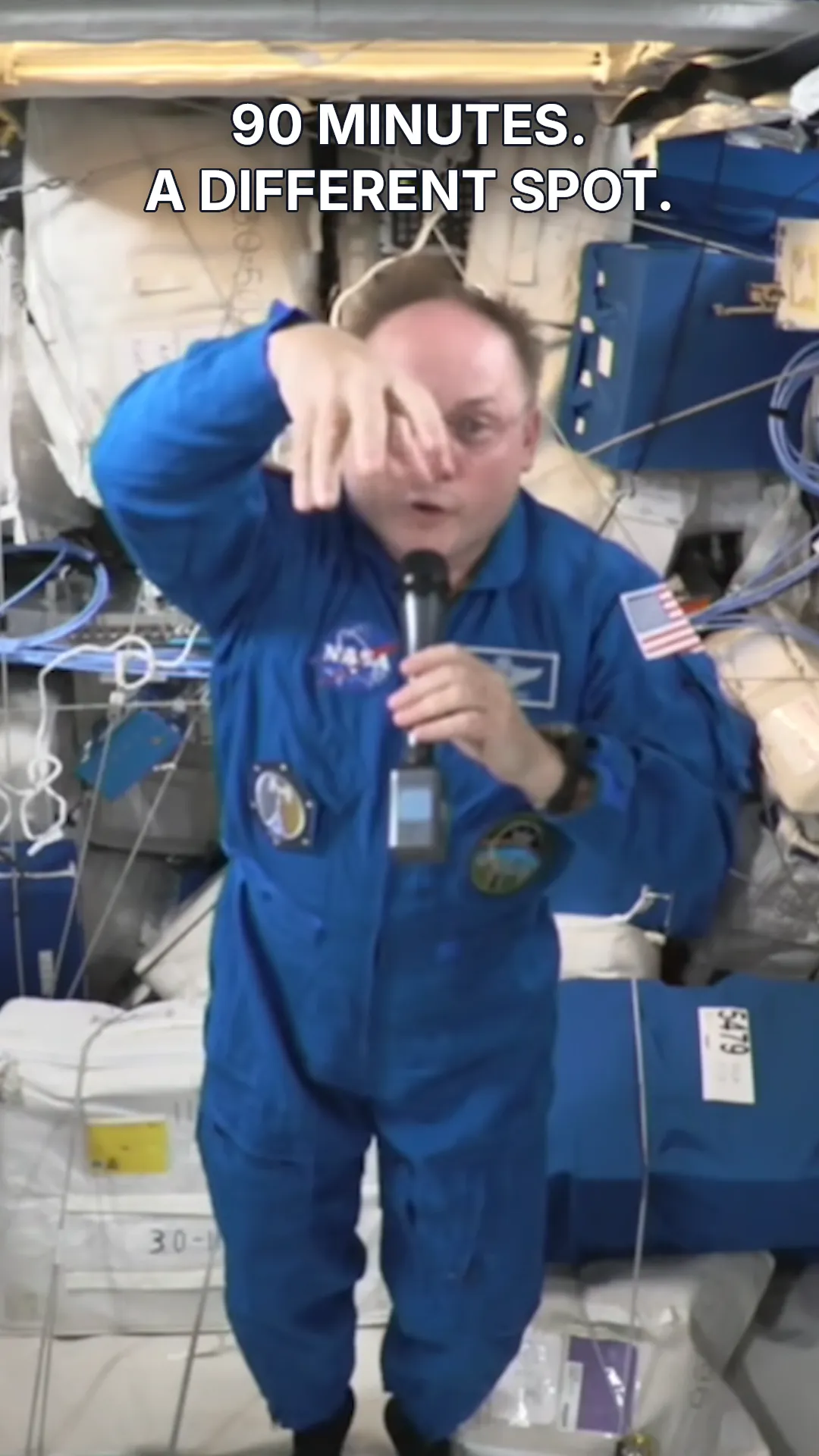 Astronaut inside the space station beneath the title “90 minutes. A different spot.”